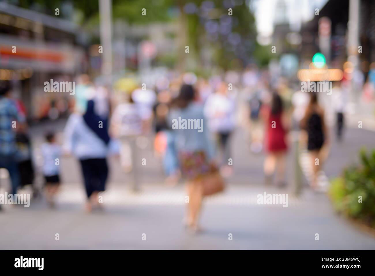 Blurred People Walking In Singapore City At Orchard Road Stock Photo