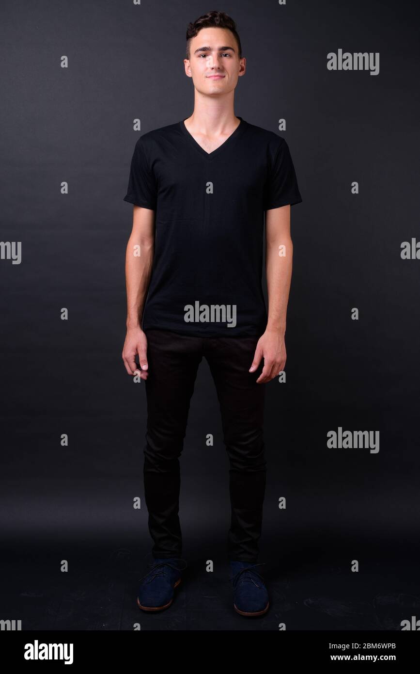 Full body shot of young handsome man Stock Photo - Alamy