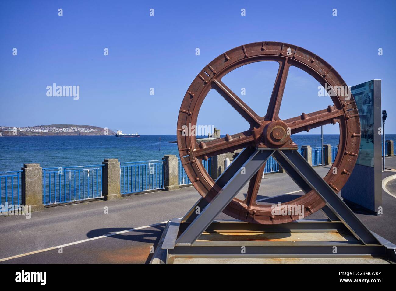 Tower of Refuge seen through the spoke of large cast iron wheel used in Douglas cable car trams Stock Photo