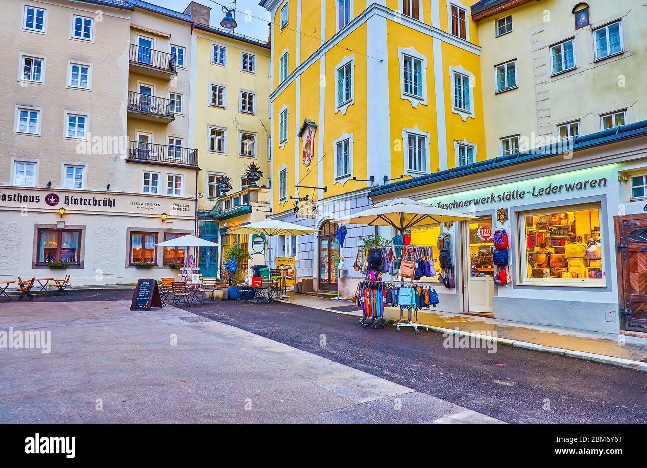 SALZBURG, AUSTRIA - MARCH 1, 2019: Walk in the heart of Kaiviertel neighborhood of Altstadt (Old Town) and observe local shops and cafes, on March 1 i Stock Photo