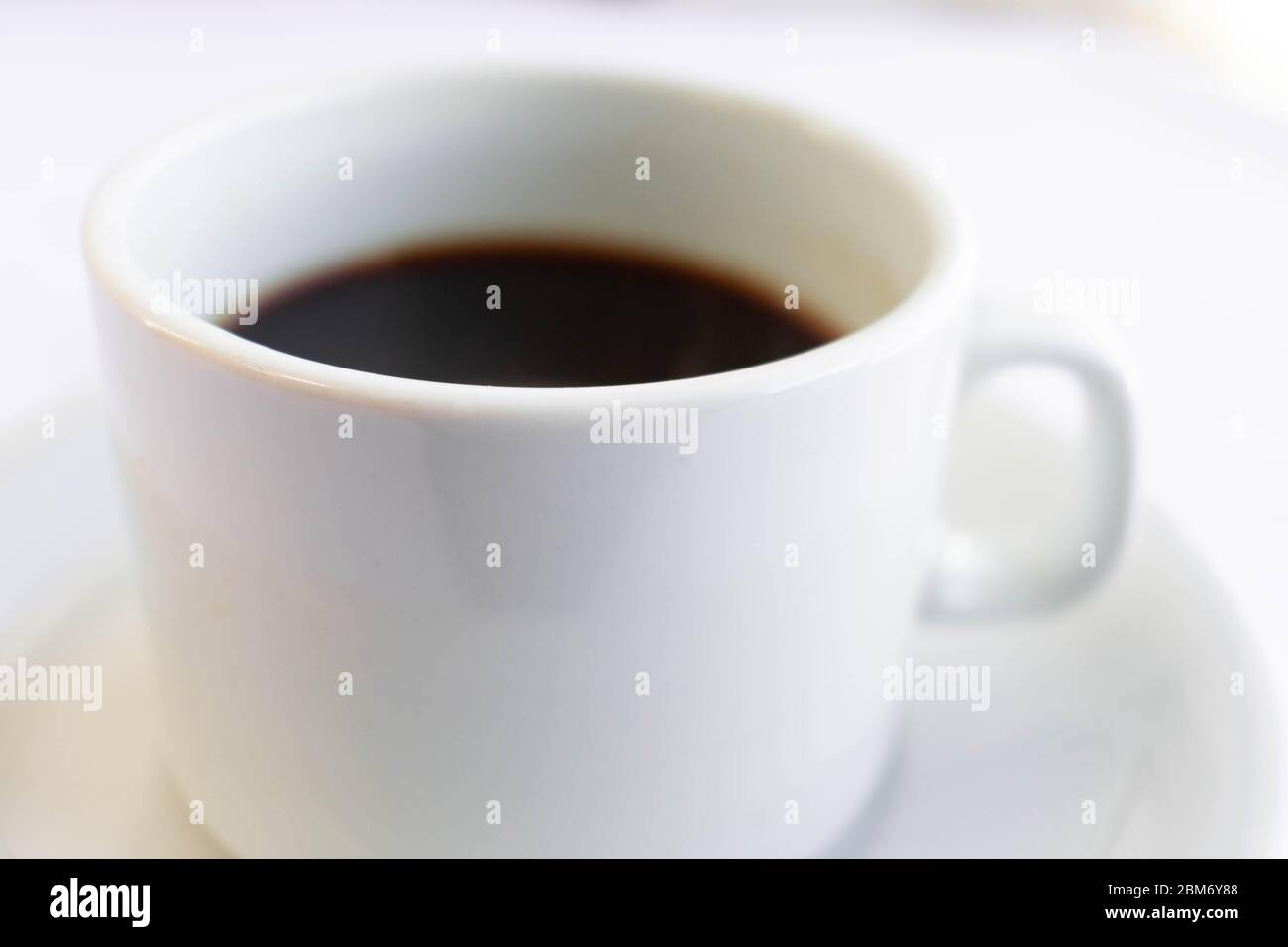 taza de cafe blanca con plato Stock Photo