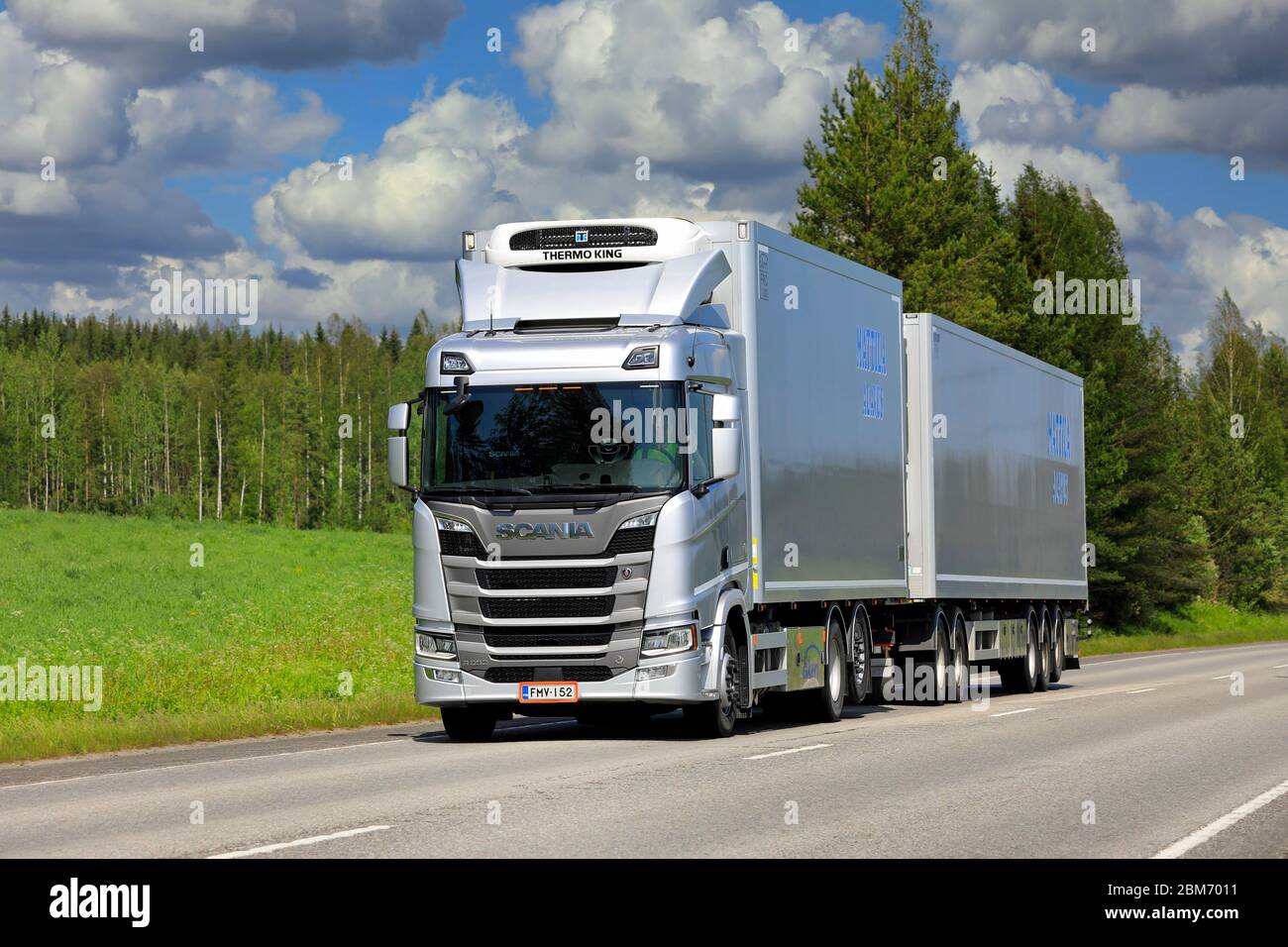 Silver Next Generation Scania R650 of Mattila pulls Thermo King refrigerated trailer along highway in the summer. Uurainen, Finland. June 8, 2019. Stock Photo