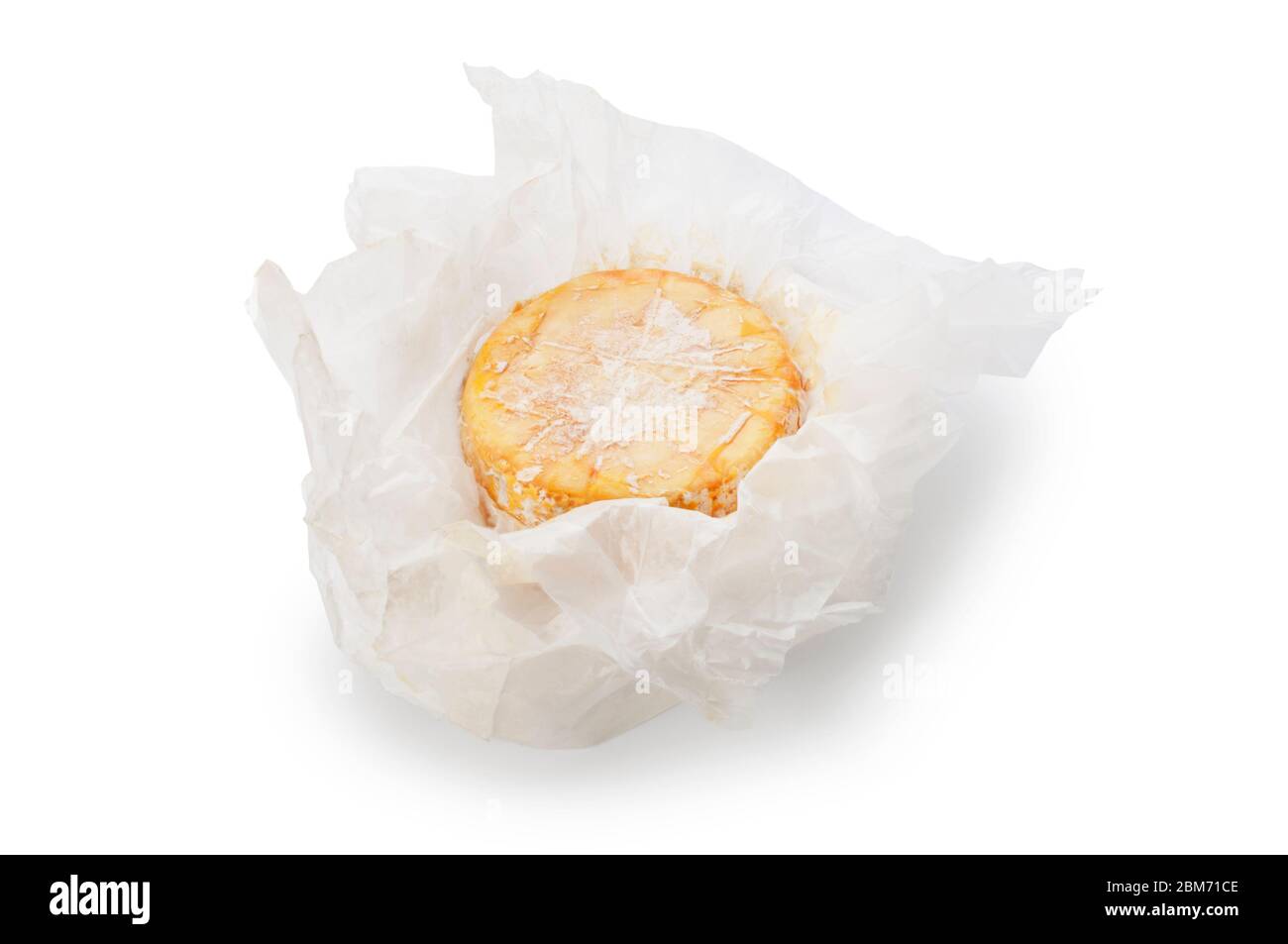 Studio shot of camembert style cheese cut out against a white background Stock Photo