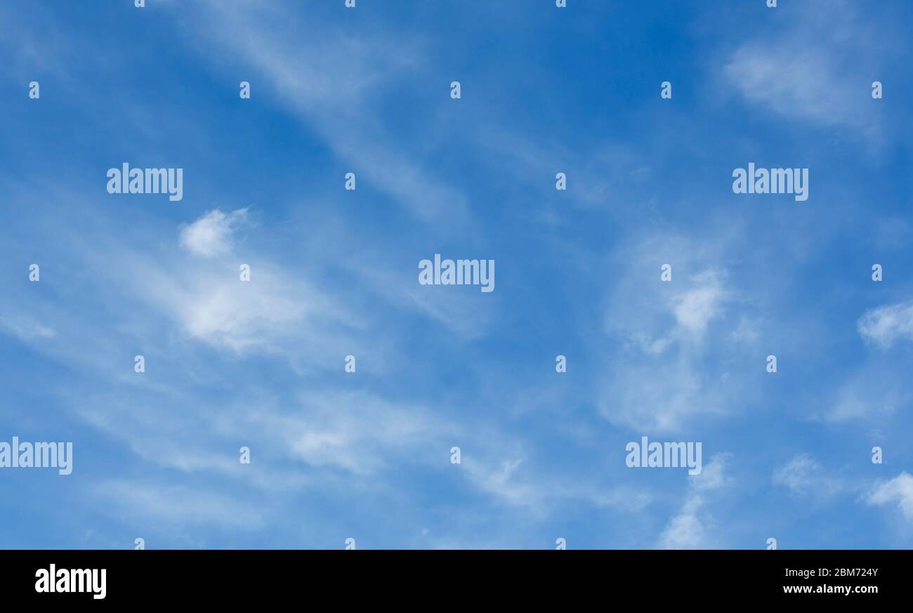 White cloud spots on clear blue sky , Finland Stock Photo - Alamy