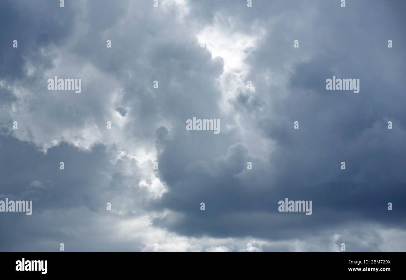 Dark grey rain clouds covering sky Stock Photo Alamy