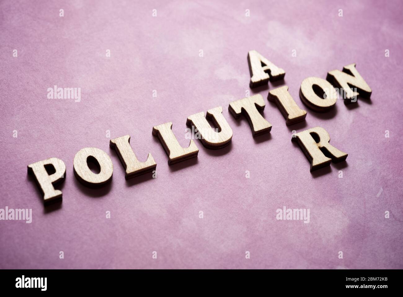 Air pollution text on a colored paper Stock Photo - Alamy