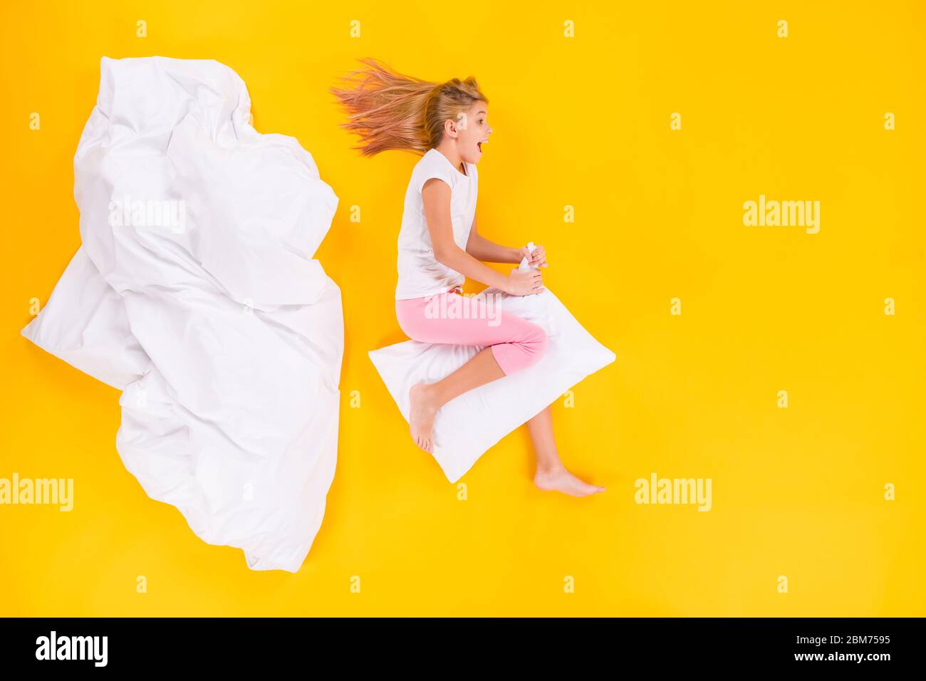 Top view above high angle flat lay flatlay lie concept of her she nice  cheerful cheery girl insomnia riding pillow having fun isolated on bright  vivid Stock Photo - Alamy
