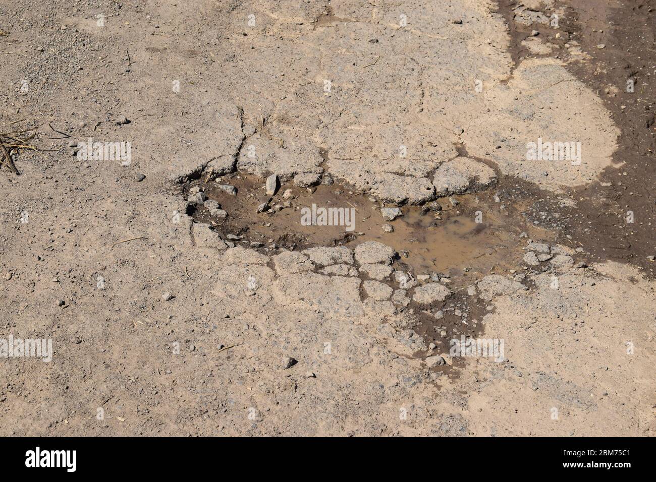 badly damaged road in Germany Stock Photo