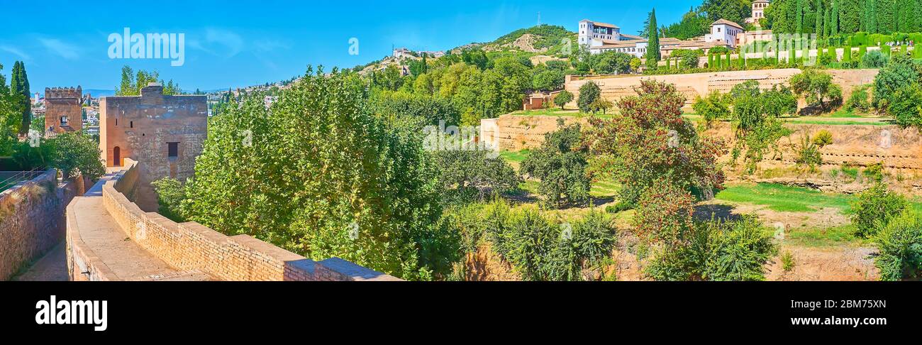 Panorama from Alhambra rampart with a view on towers and Sun Hill