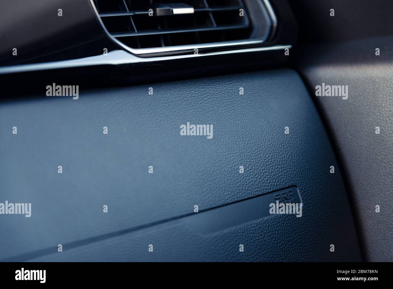 airbag icon in the passenger seat of a modern car Stock Photo Alamy