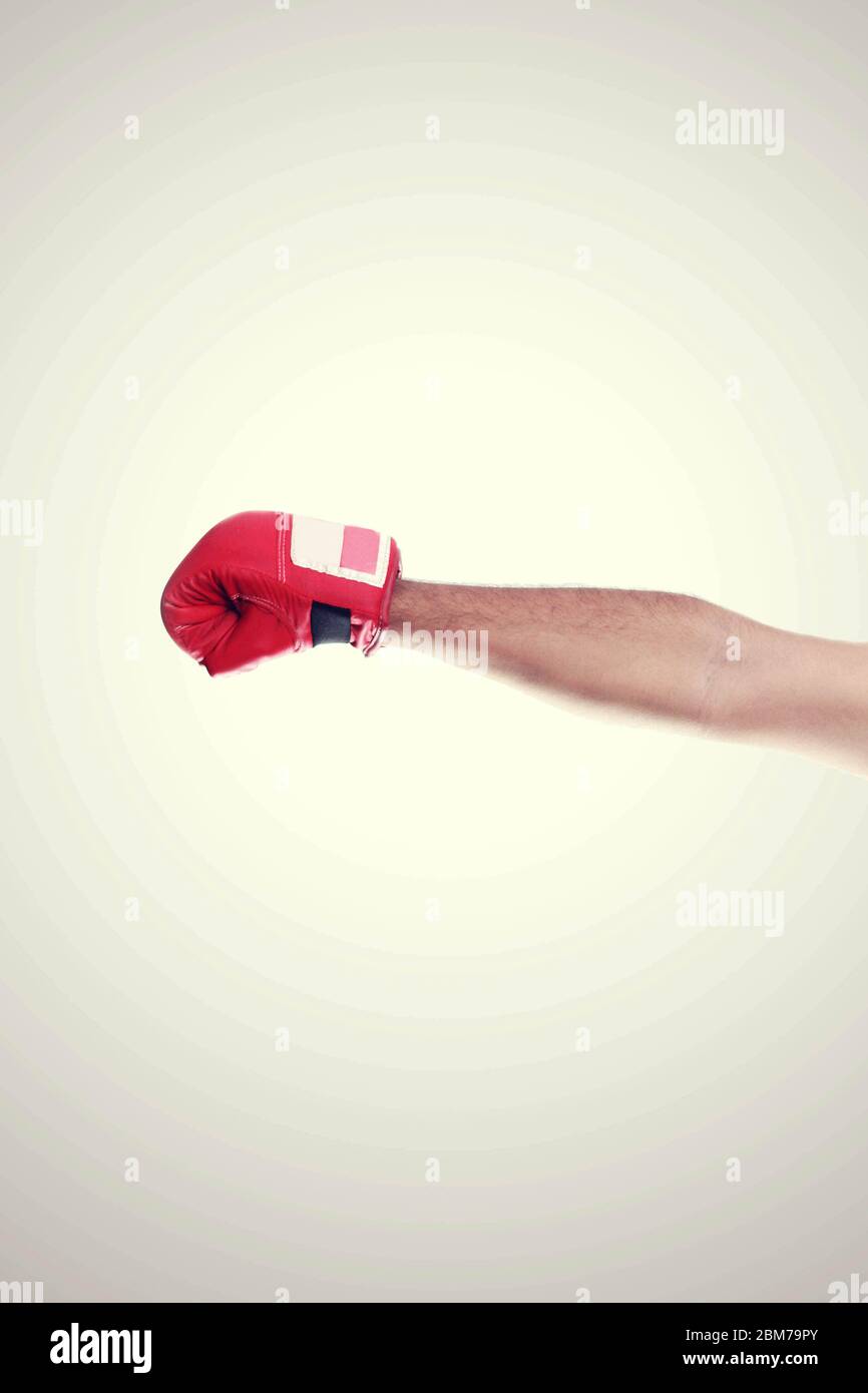 One Hand In The Frame Wearing Red Hot Boxing Gloves, Isolated On White