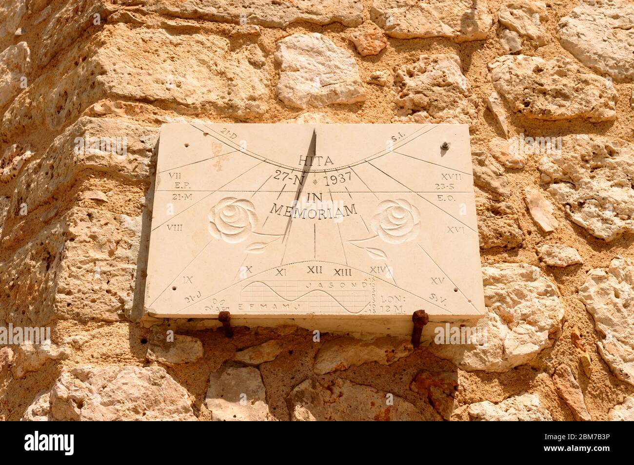 Precious Sundial Sculpted On The Wall In Memory Of The Archpriest Of Hita. July 23, 2019. Hita Guadalajara Castilla La Mancha. Spain. Travel Tourism H Stock Photo