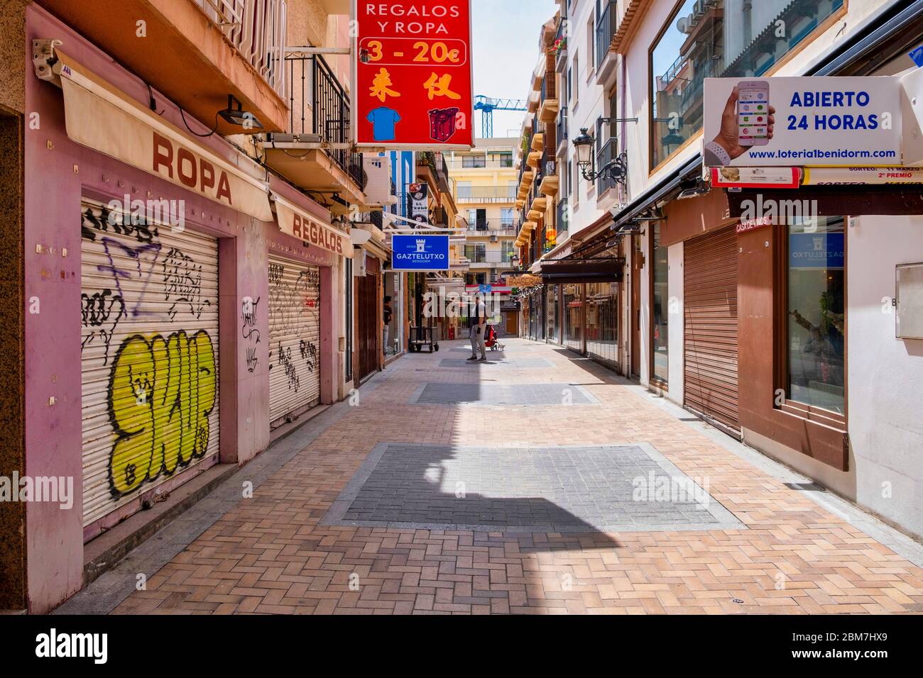 Benidorm, Alicante Spain, 4.5.2020, Corona crisis: closed tapas restaurants in Calle Santo Domingo of the old town. usually the place is densely crowded with people at midday Stock Photo