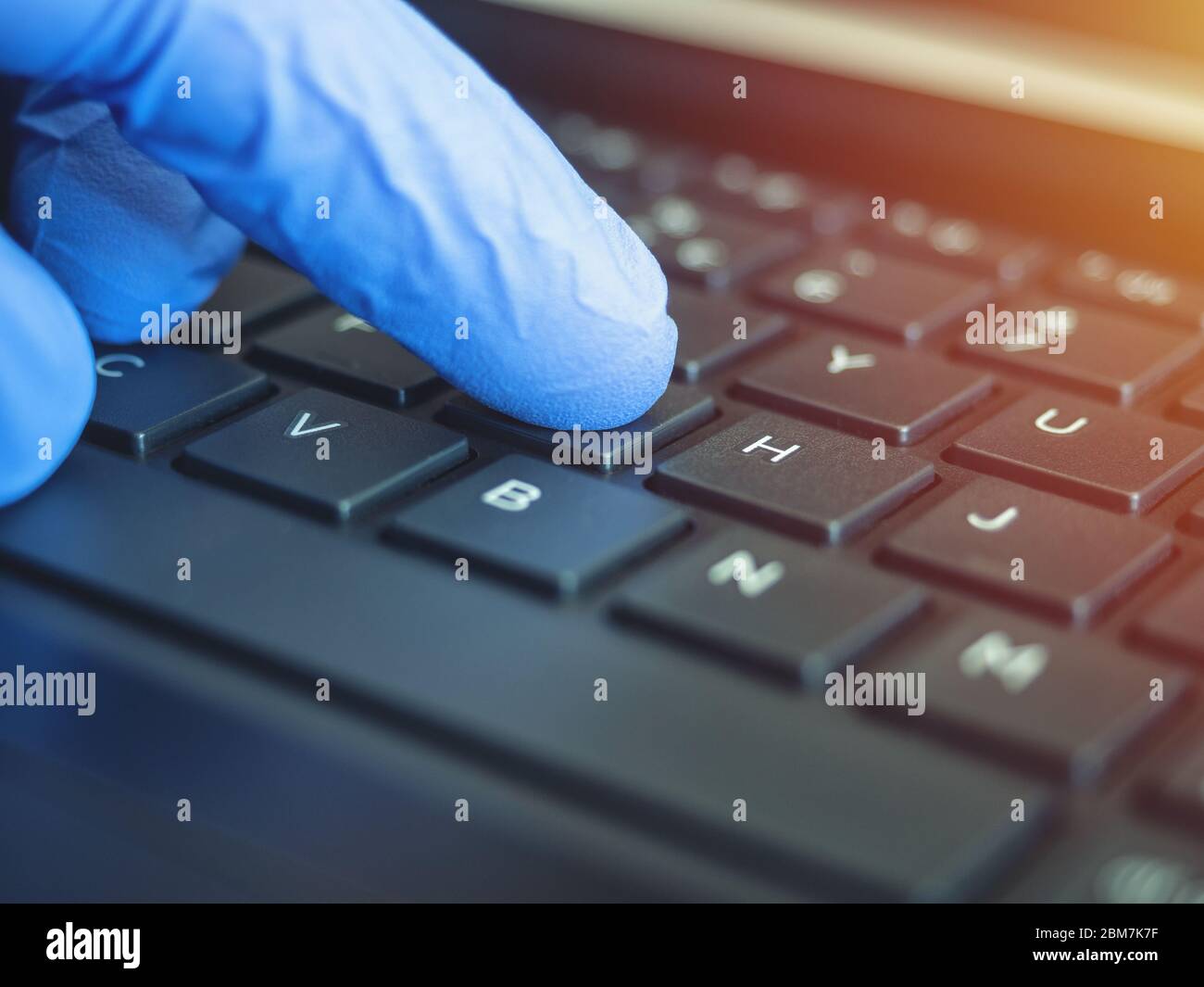 Online quarantine training. Remote online work. Coronovirus. Epidemic.  Hands in protective medical gloves are typing on the keyboard Stock Photo -  Alamy