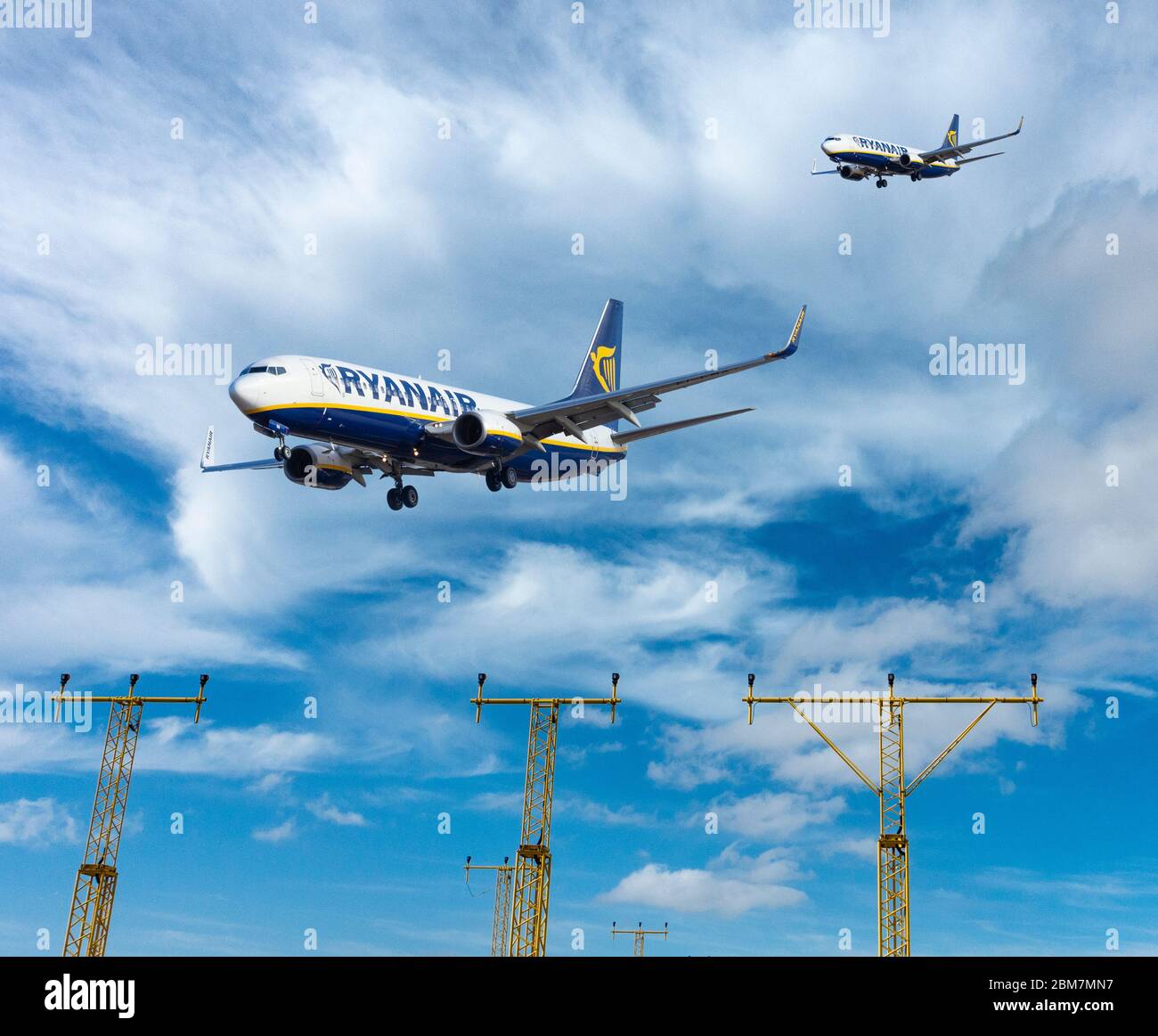 Two Ryanair aircraft, airplanes on landing approach. Airline industry, air traffic control... Stock Photo