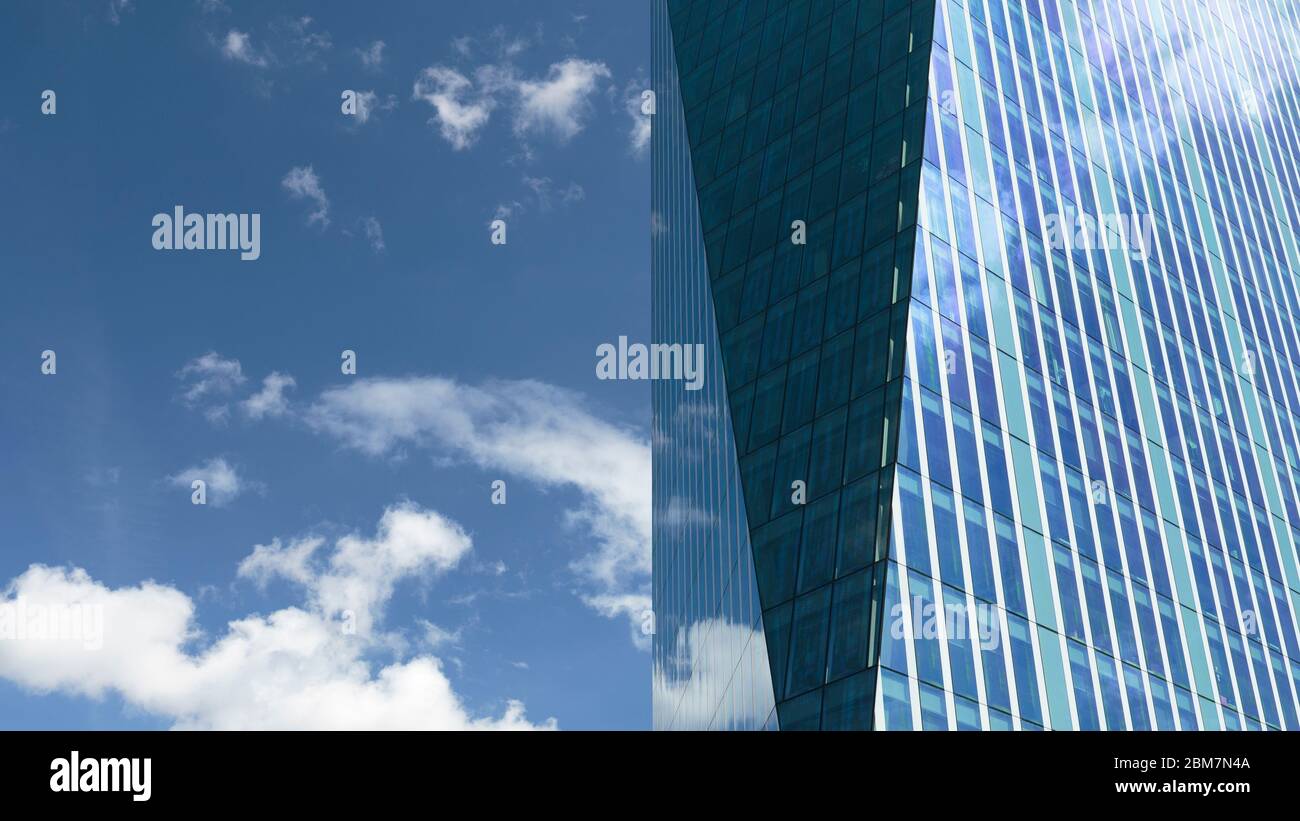 Reflection of the sky on the windows of a modern office building, London, England Stock Photo