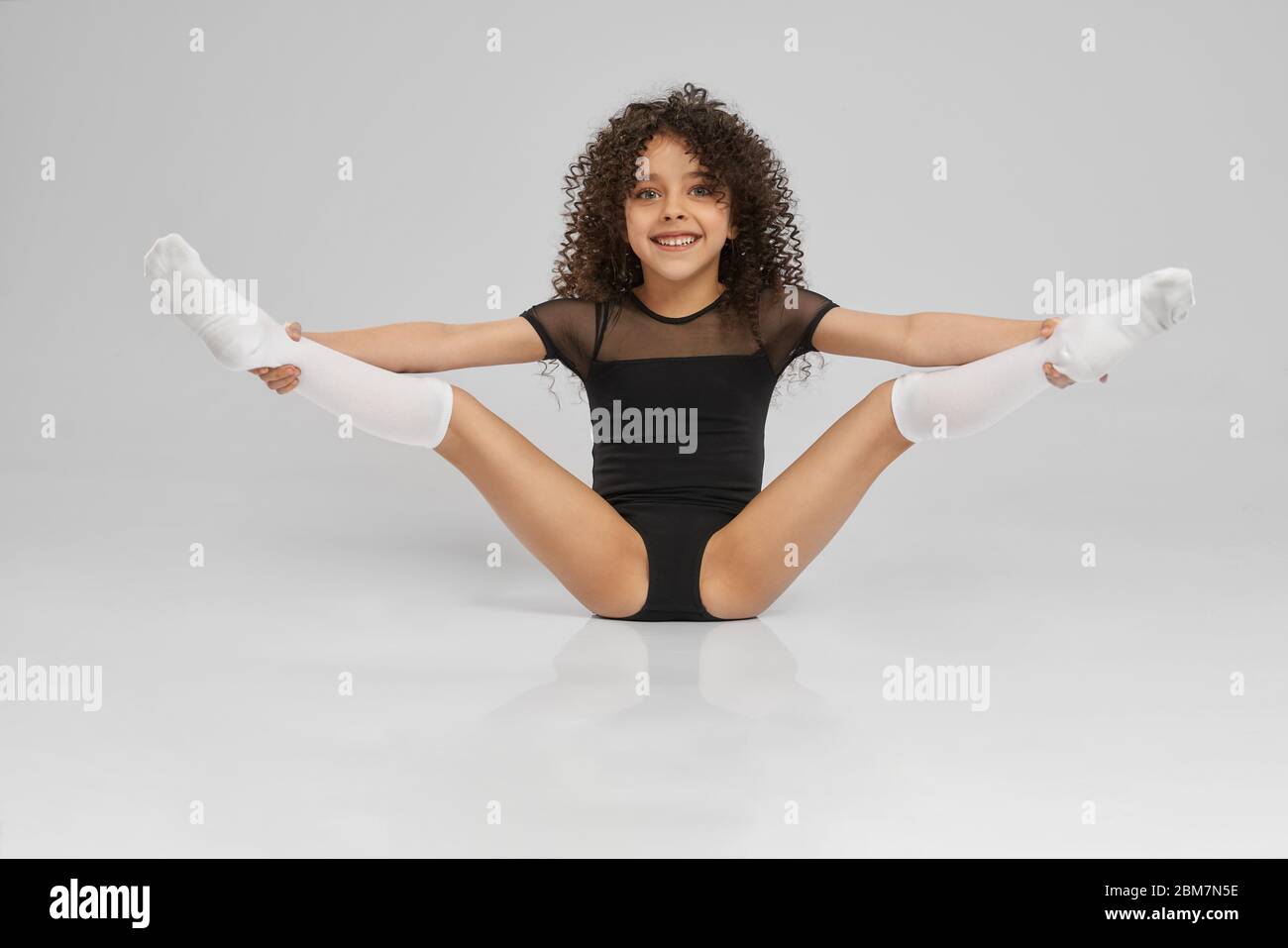 Legs up gymnastics hi-res stock photography and images - Alamy