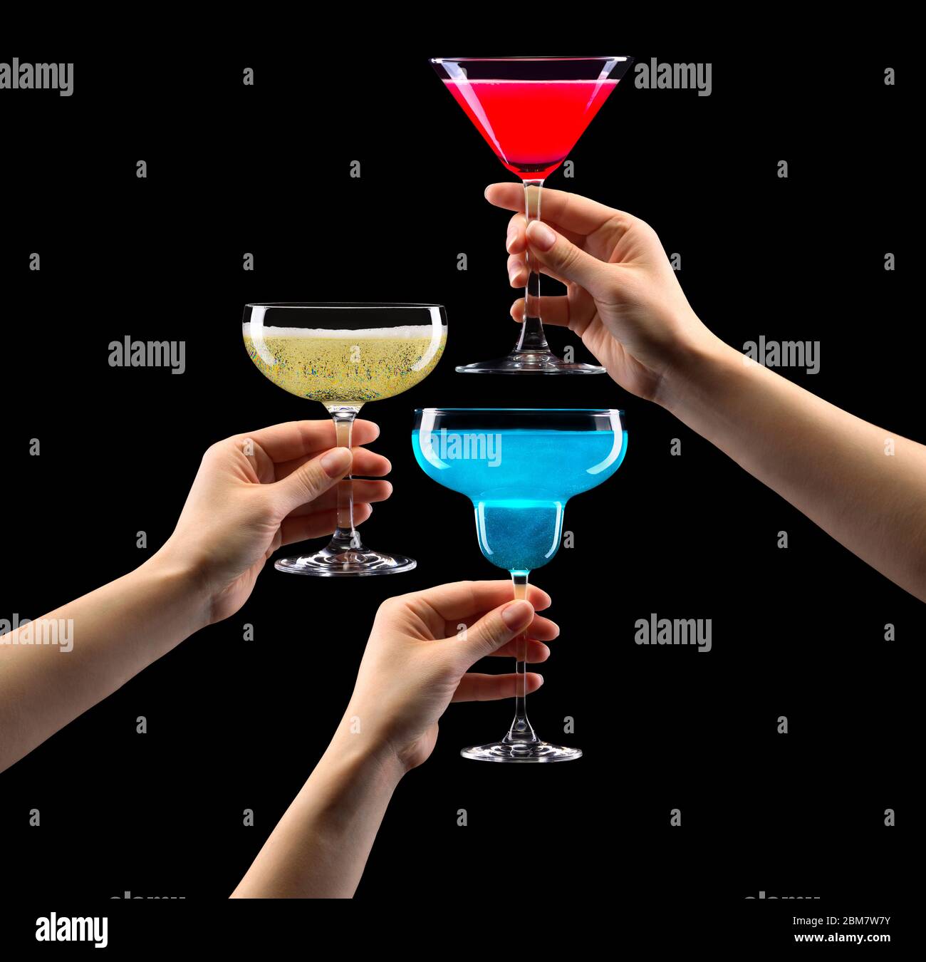 Set of hands holding cocktails isolated on black background Stock Photo