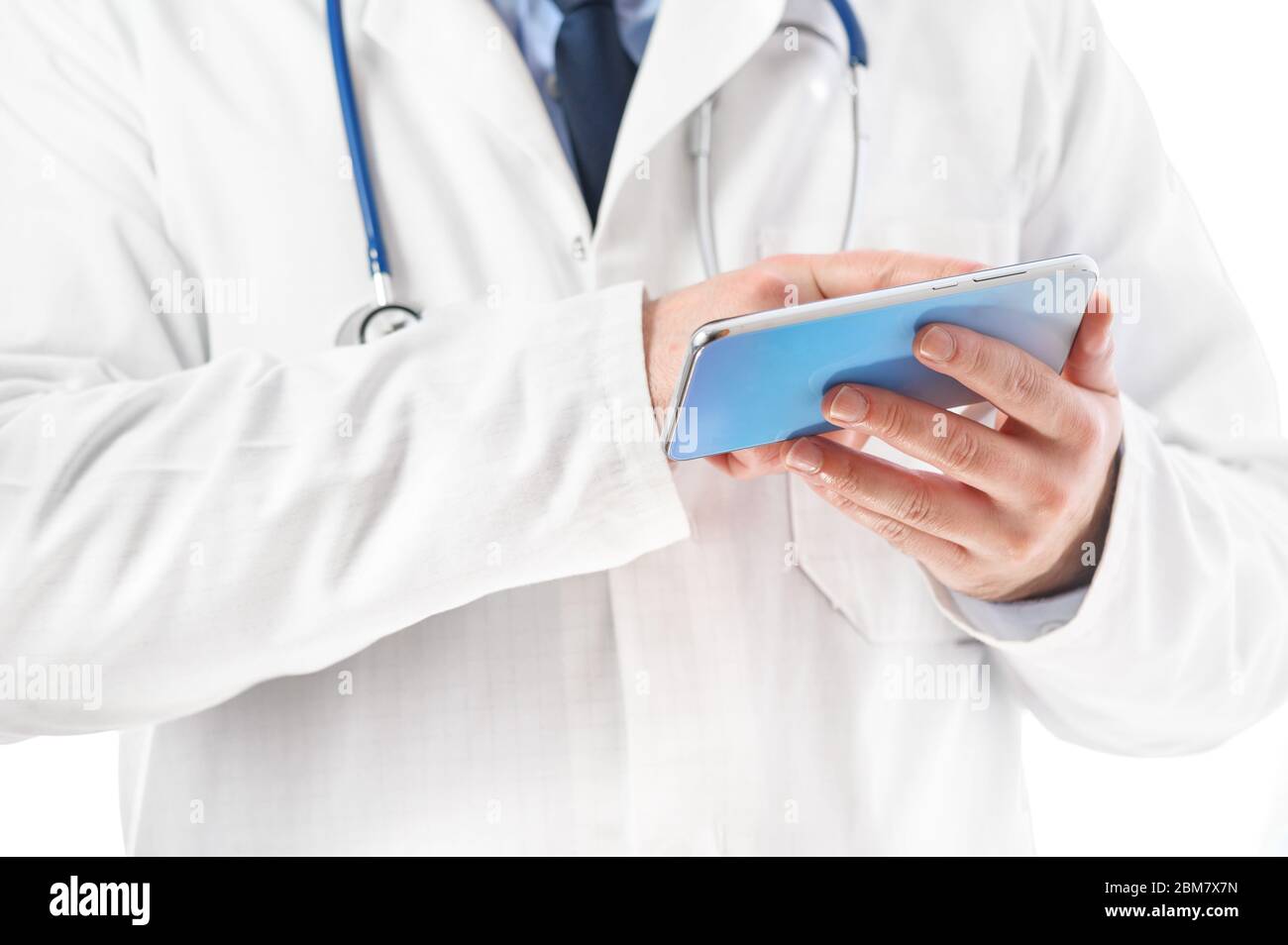 Doctor using mobile phone close up view . Stock Photo
