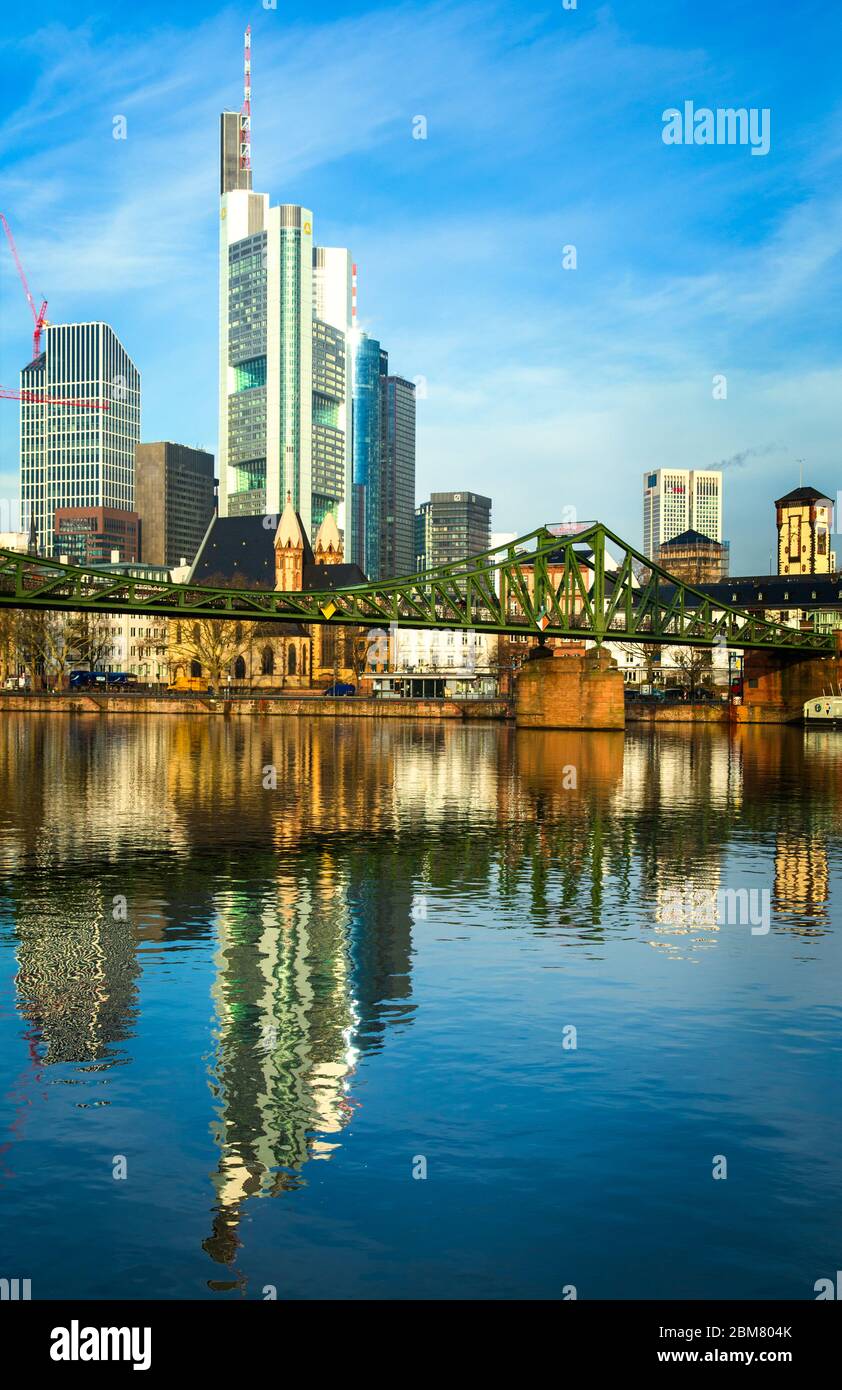 Early morning view of central Frankfurt am Main and th Eiserner Steg from across the river Main. Stock Photo