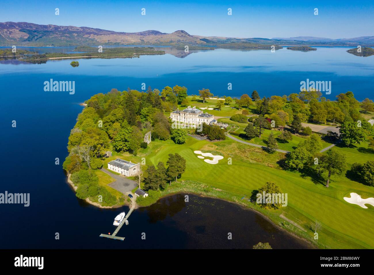 Aerial view of Loch Lomond Golf Club on shores of Loch Lomond, closed during Covid-19 lockdown, Argyll and Bute, Scotland, UK Stock Photo