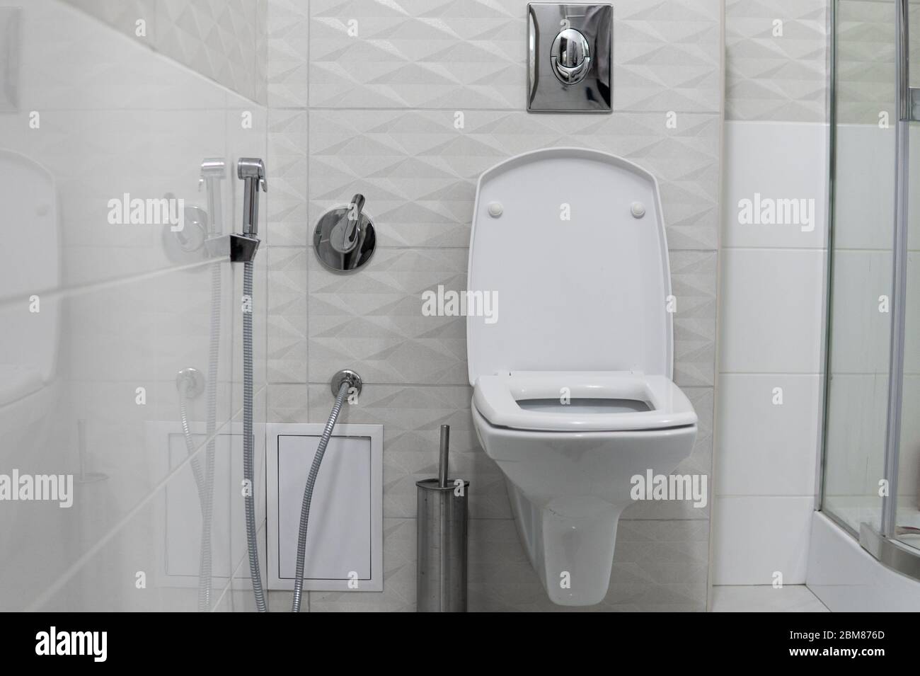 White toilet bowl in modern light bathroom interior Stock Photo - Alamy