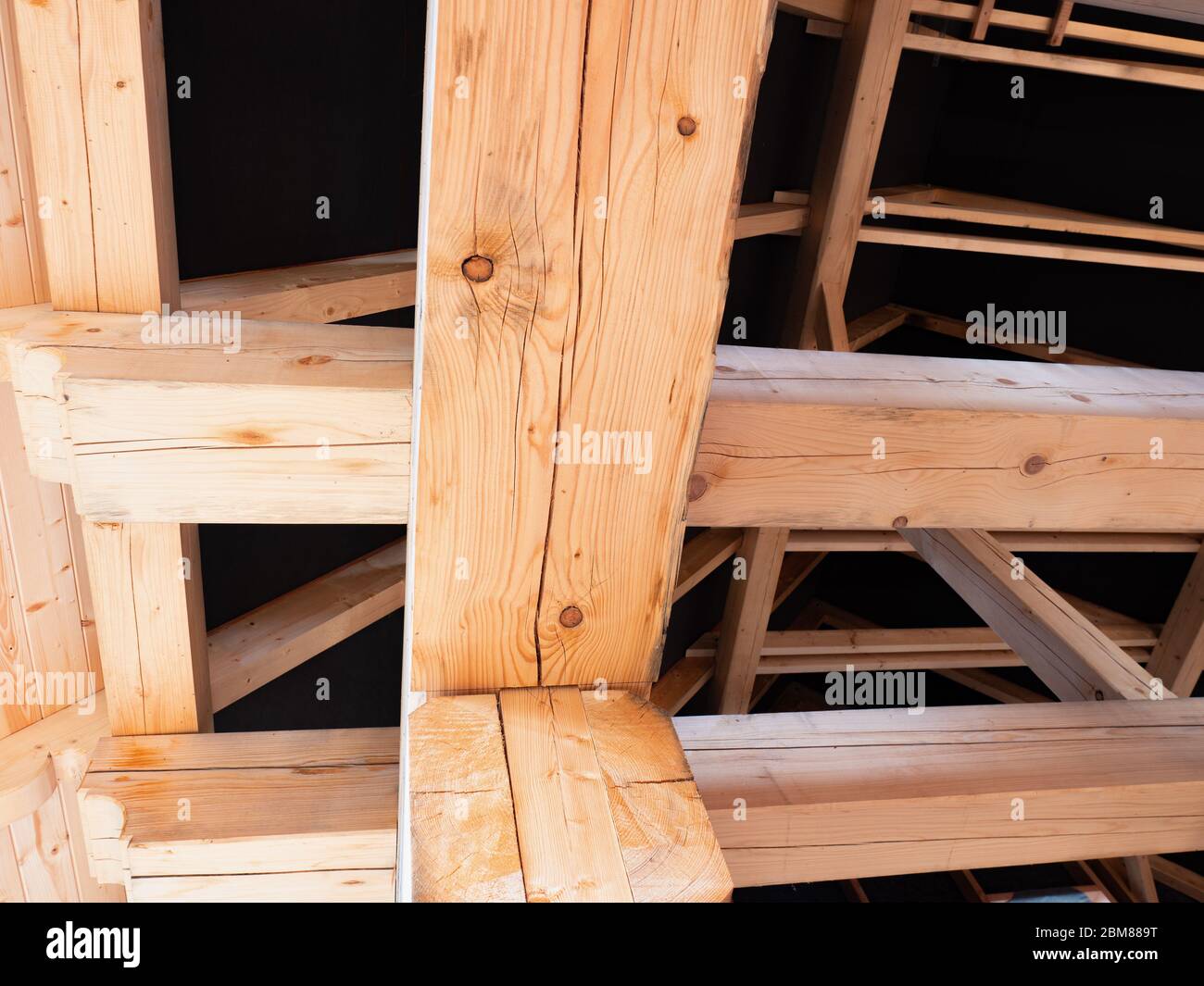 Wooden spruce beams, trusses of wooden house. Natural smell wood, good