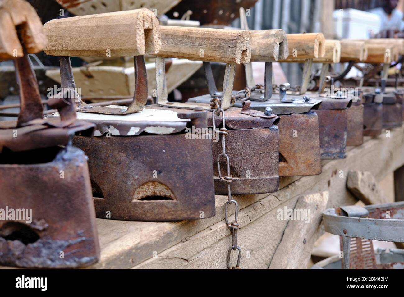 Irons for sale at a Kano street market stall Stock Photo Alamy