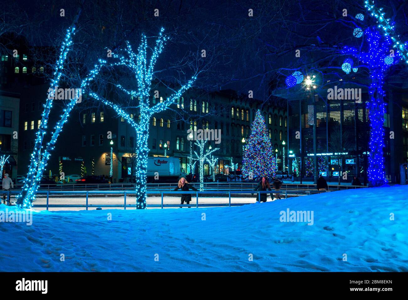 Rosa Parks Circle lit up while people are ice skating in Grand Rapids