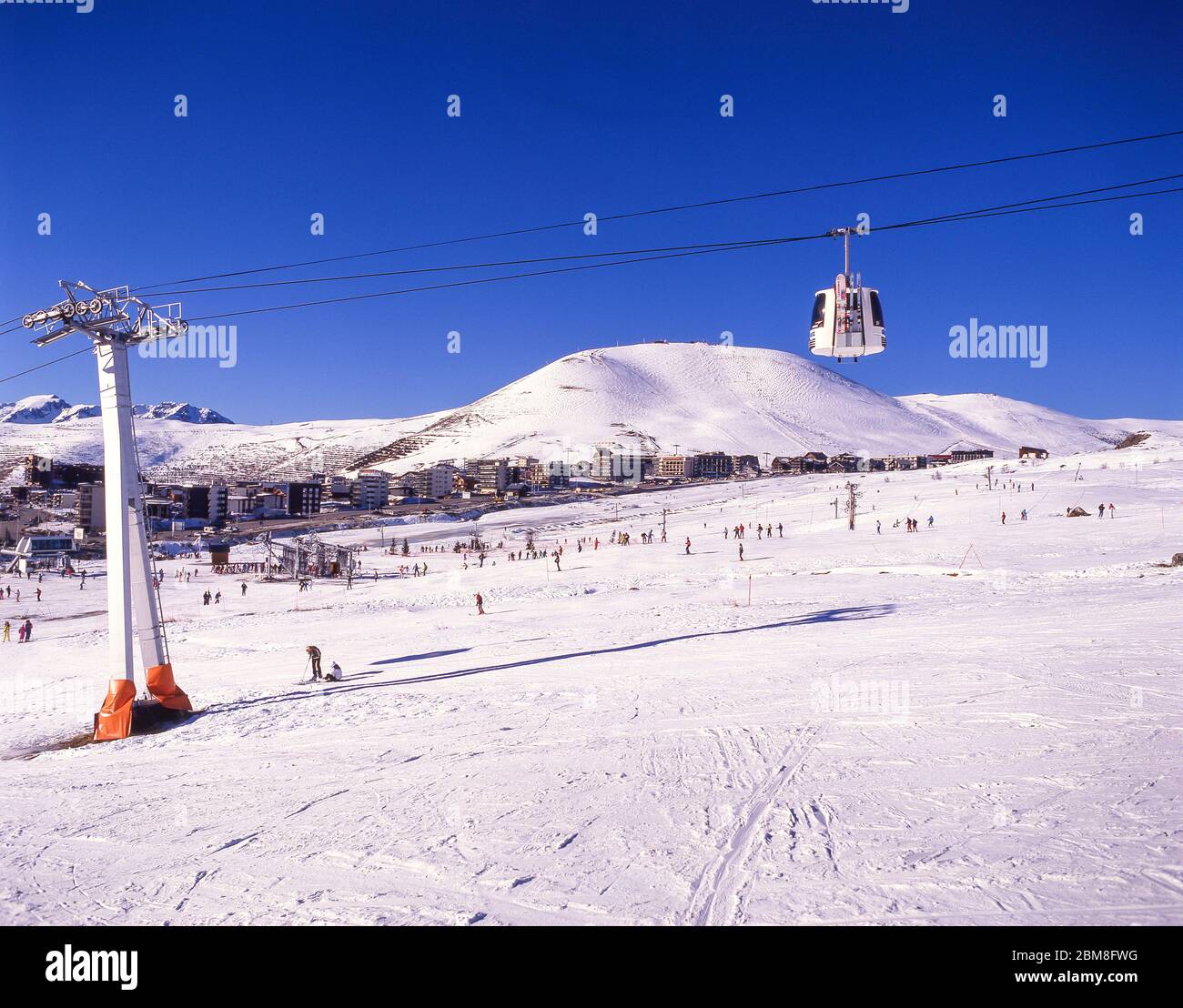 Resort view from lower slopes, Alpe d'Huez, Isere, Auvergne-Rhone-Alpes, France Stock Photo