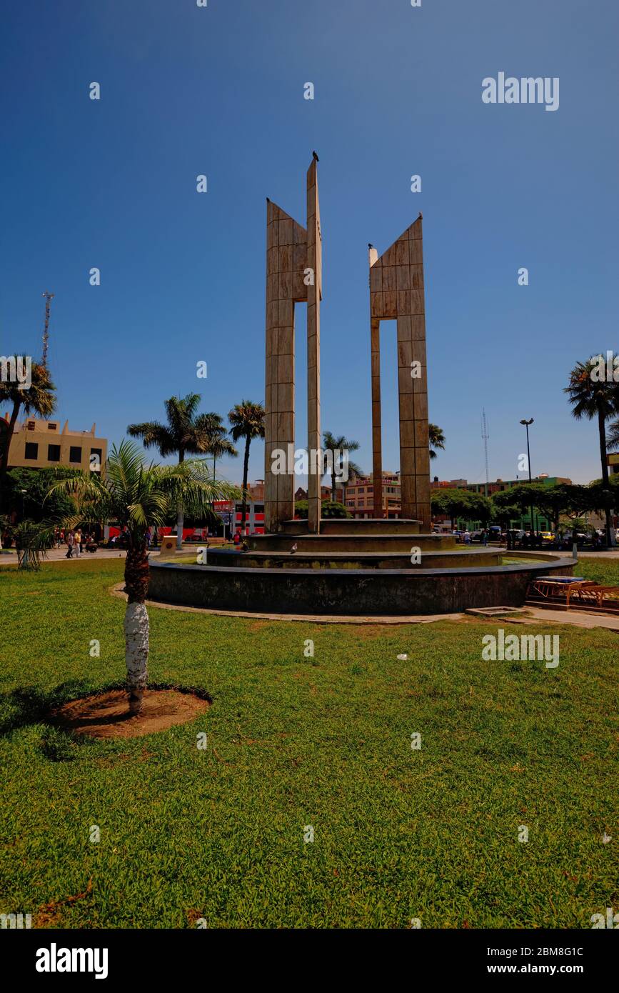 Chimbote, Peru - April 10, 2018: Main square in Chimbote Peru, Plaza de Armas, with decorative paving and central water feature Stock Photo