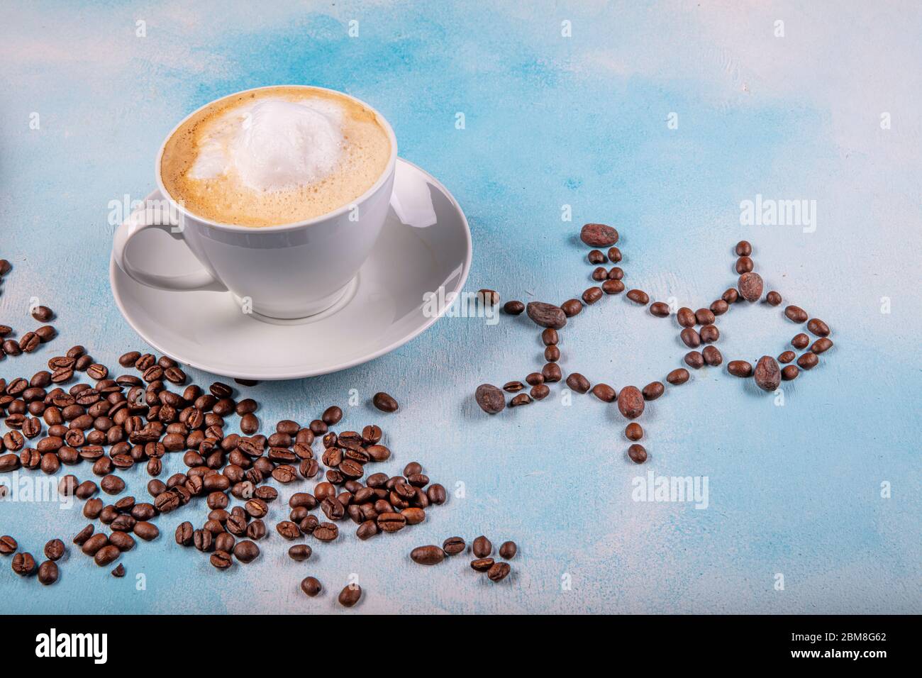 A Cup Of Coffee With Caffeine Molecule Created By Coffee Beans Chemical Formula Of Caffeine With Roasted Coffee Spill Out Of Cup On Blue Wooden Backg Stock Photo Alamy A Cup Of Coffee With Caffeine Molecule Created By Coffee Beans Chemical Formula Of Caffeine With Roasted Coffee Spill Out Of Cup On Blue Wooden Backg Stock Photo Alamy