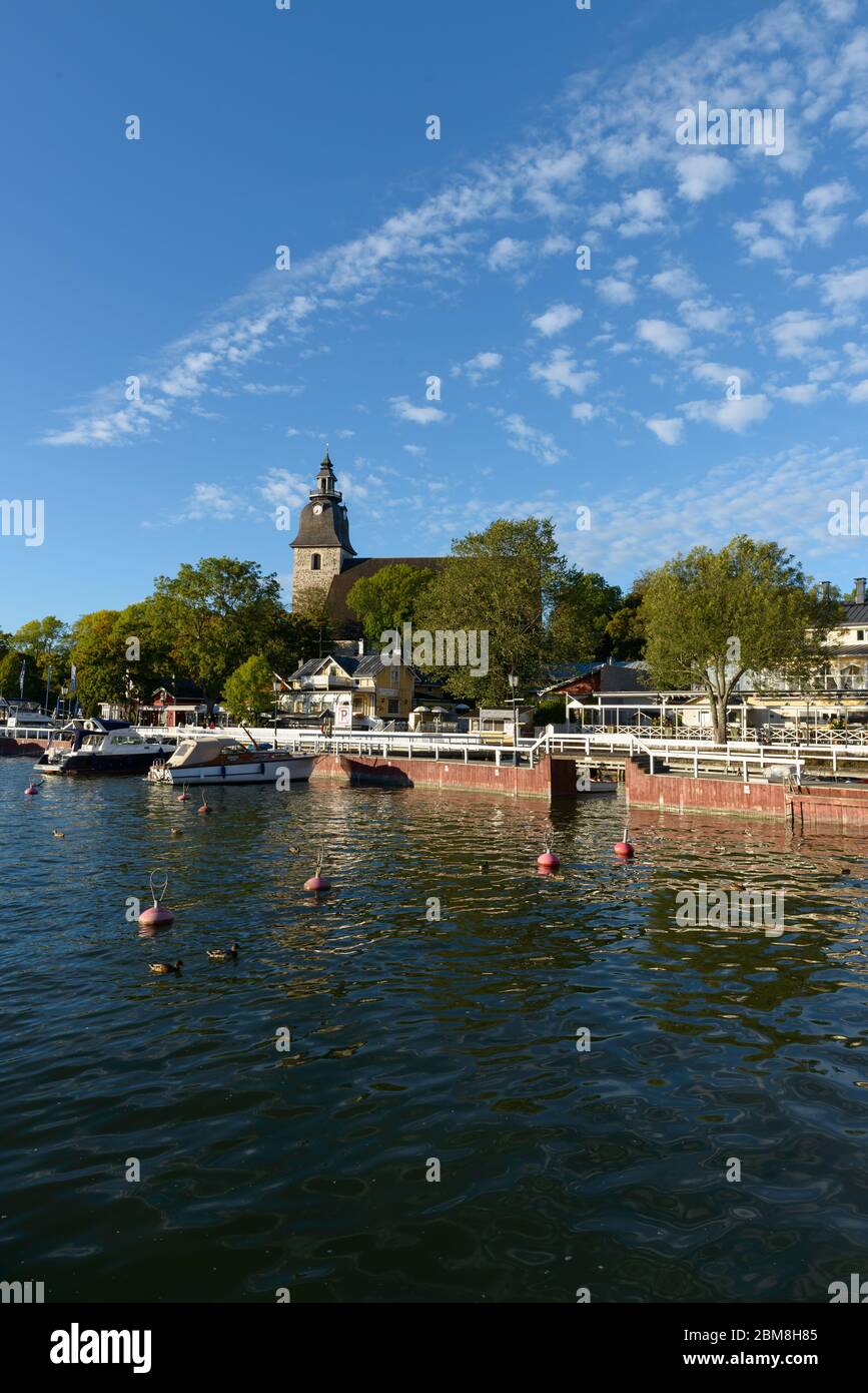 Beautiful scenery of the harbor and Christian church in Finland Stock Photo
