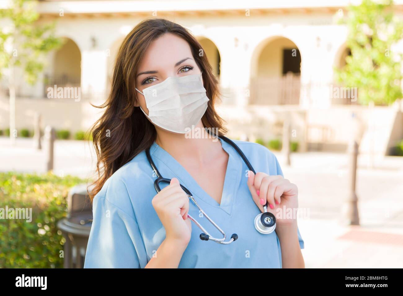 Nurse wearing stethoscope wear hi-res stock photography and images - Alamy