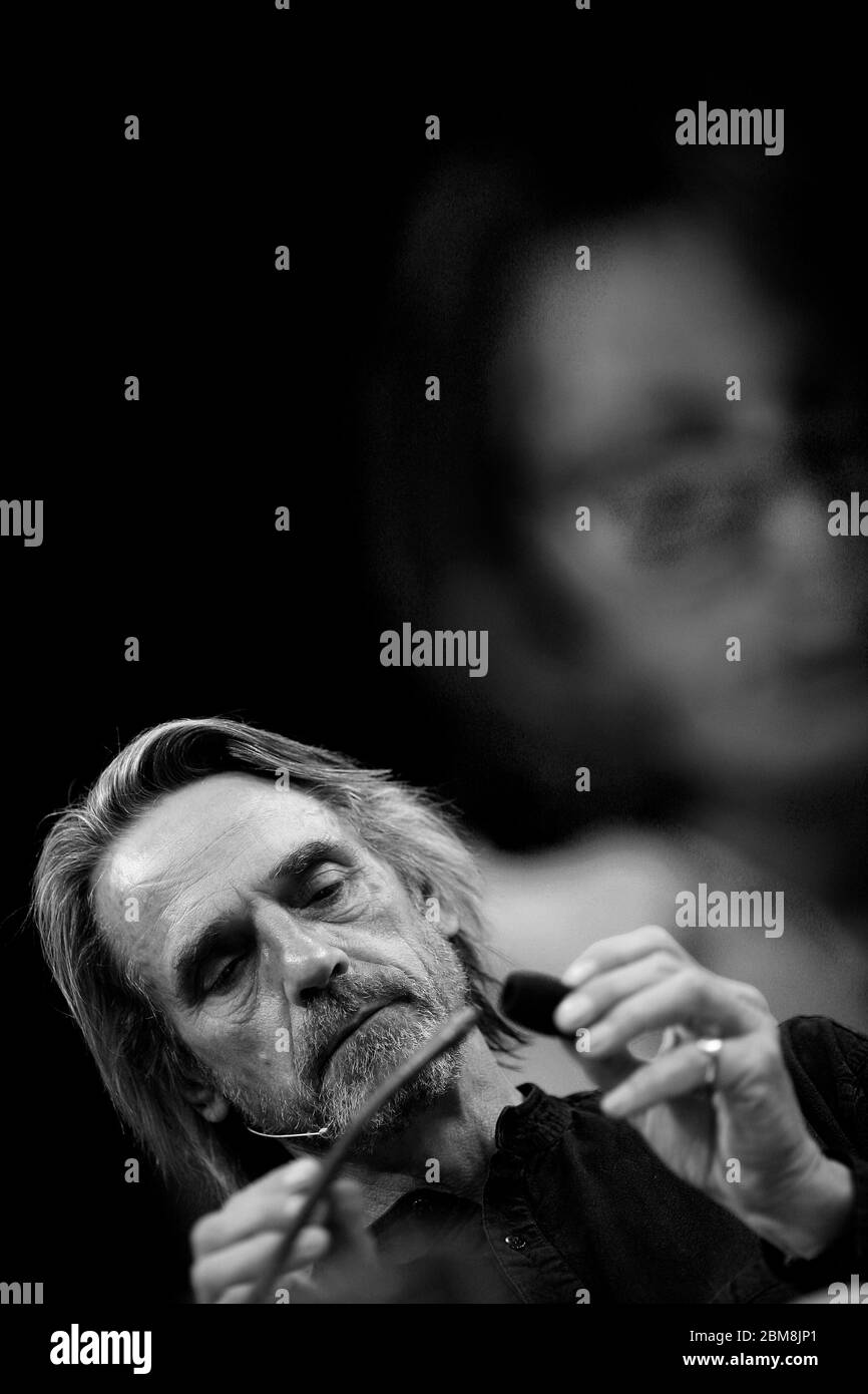 Jeremy Irons reading poetry of The Great War on stage at Hay Festival 2013 Hay on Wye Powys Wales UK ©PRWPhotography Stock Photo
