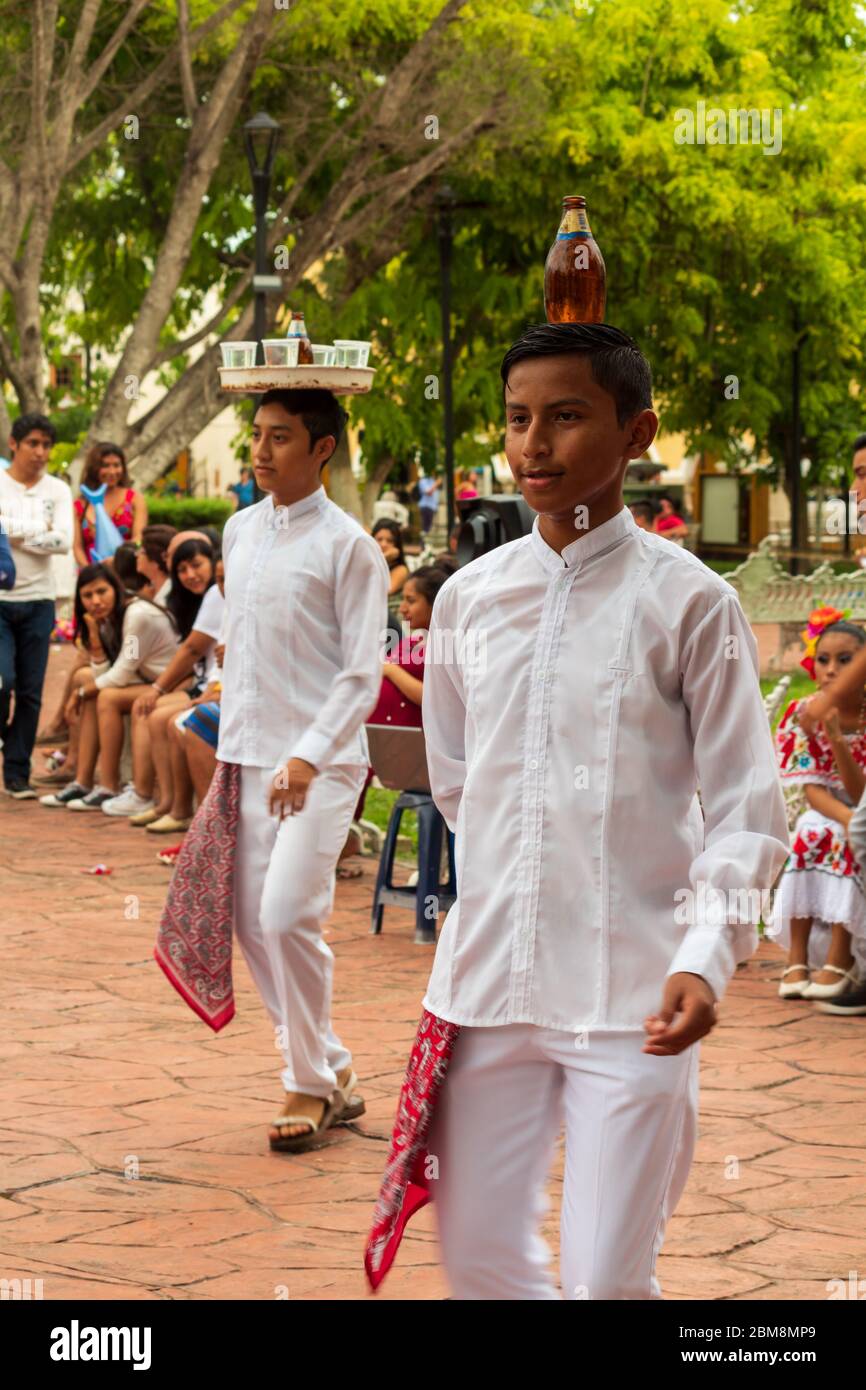 Traditional Mexican folklore dance in public square. These dancers