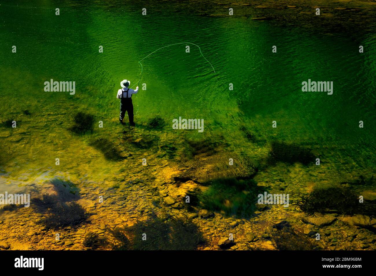 This fly fisherman found a beautiful stretch of emerald green water on