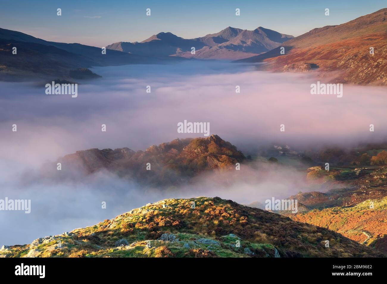 Looking to Mount Snowdon overt the Pinnacles & Dyffryn Mymbyr shrouded in Fog, Capel Curig, Snowdonia National Park, North Wales, UK Stock Photo