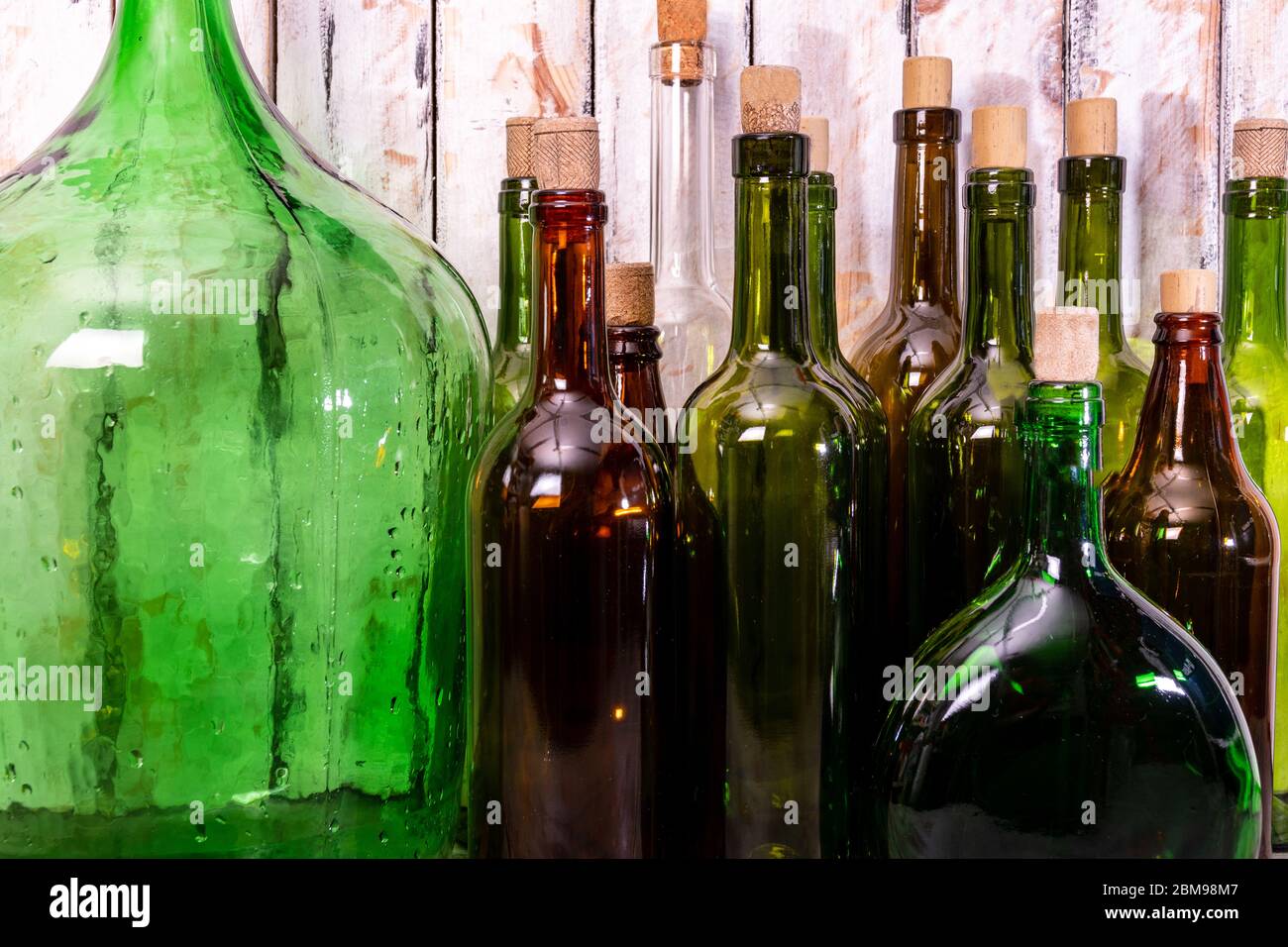 glass wine bottles of different sizes Stock Photo Alamy