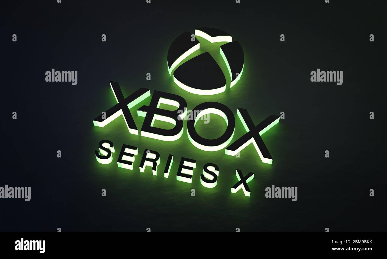 Xbox Series X Green Glow Logo on Dark Background Stock Photo
