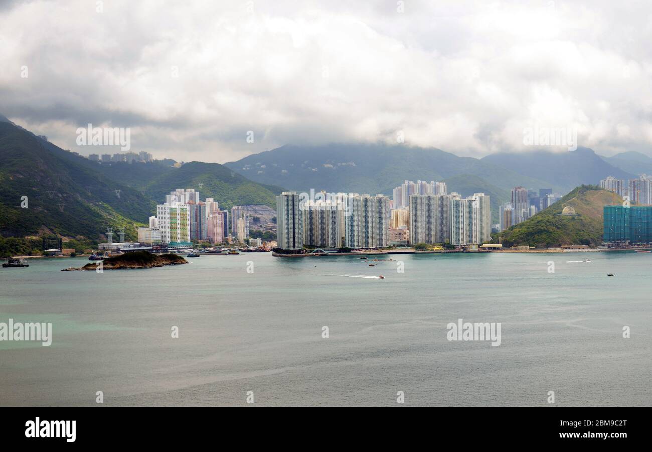A view of Hong Kong's Aberdeen and South Horizons residential complex as seen from Lamma island. Stock Photo