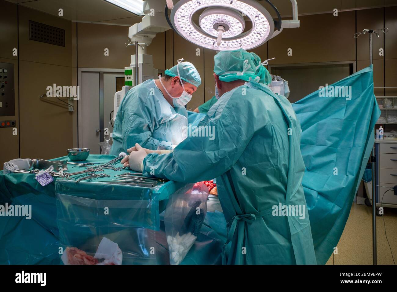 a surgical team performs a surgical abdominal operation Stock Photo