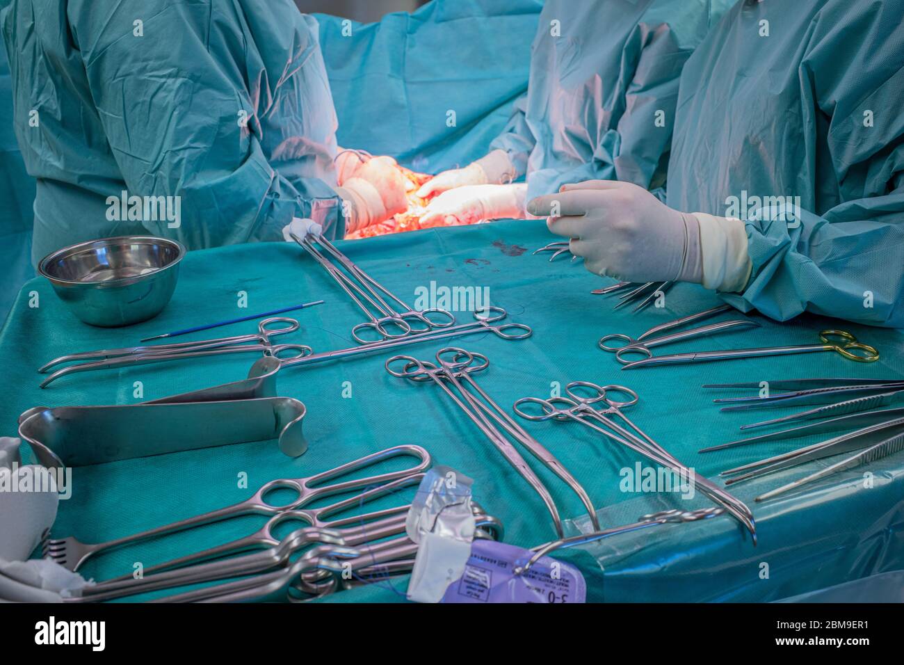 a surgical team performs a surgical abdominal operation Stock Photo