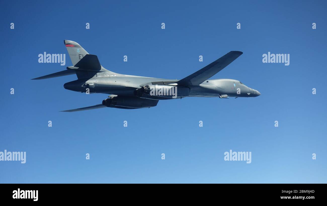 A B-1B Lancer flies during a training mission for Bomber Task Force Europe, May 5, 2020. Aircrews from the 28th Bomb Wing at Ellsworth Air Force Base, South Dakota, took off on their long-range, long-duration Bomber Task Force mission to conduct interoperability training with Danish fighter aircraft and Estonian joint terminal attack controllers ground teams. Training with our NATO allies and theater partner nations contribute to enhanced resiliency and interoperability and enables us to build enduring relationships necessary to confront the broad range of global challenges. (Courtesy photo by Stock Photo