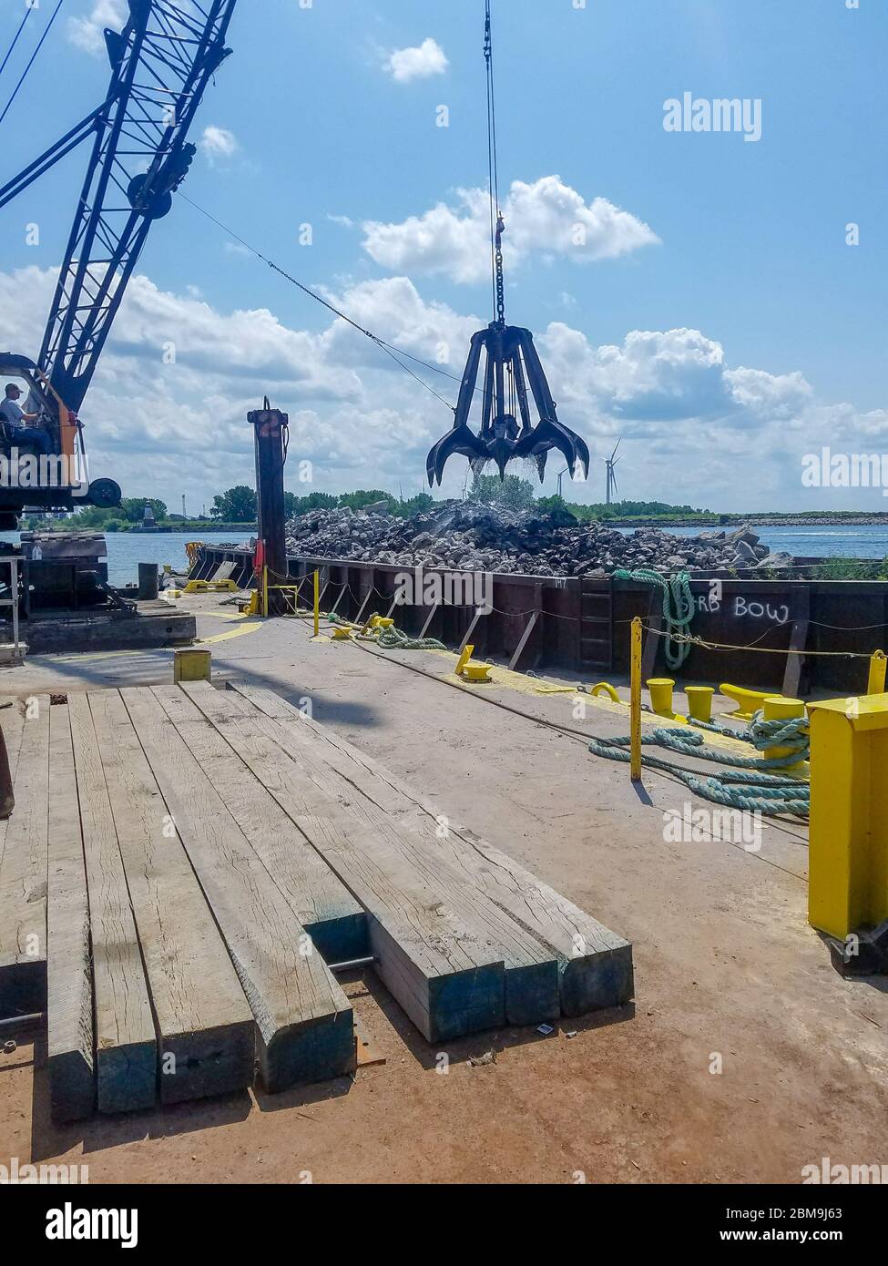 The U.S. Army Corps of Engineers Buffalo District makes repairs to damaged areas of critical need on the Buffalo south breakwater located in the Buffalo Harbor, Buffalo, NY, July 26, 2019.     Credit: Andrew Kist, Buffalo District engineer Stock Photo