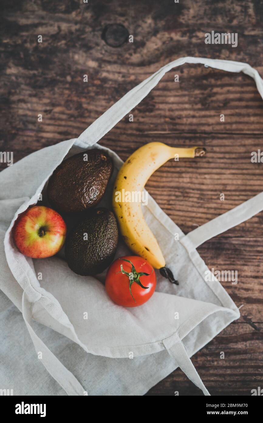 healthy-plant-based-food-ingredients-concept-market-bag-with-fruit-and
