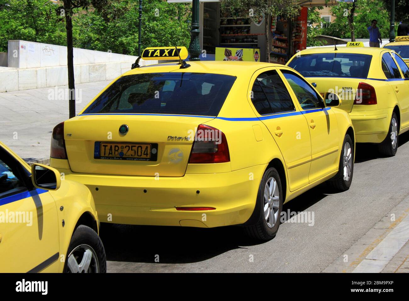 Taxi cabs in a row waiting in Athens, Greece, May 6 2020. Stock Photo