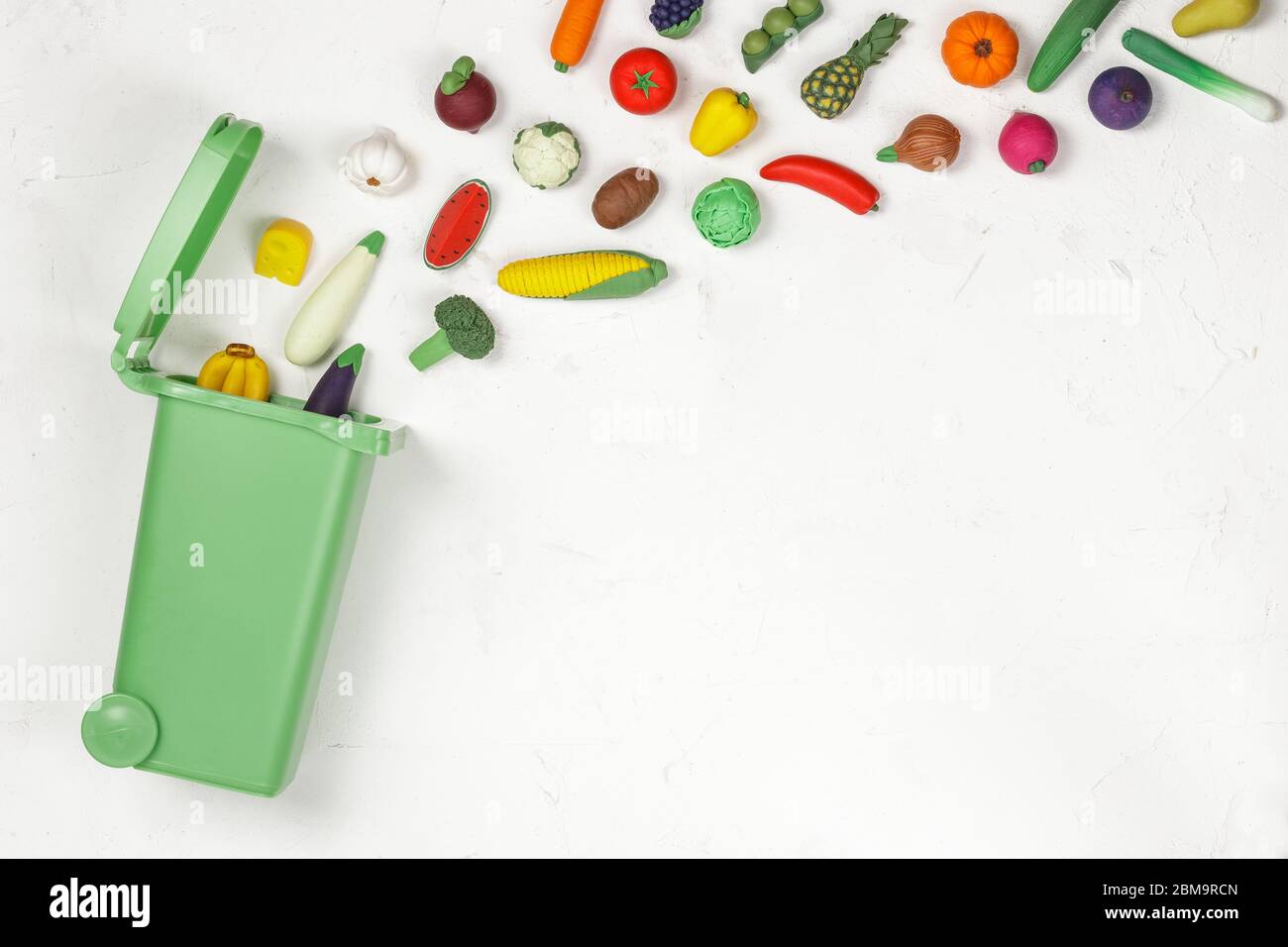 Food Waste Prevention Concept. Fruits and Vegetables falling into the