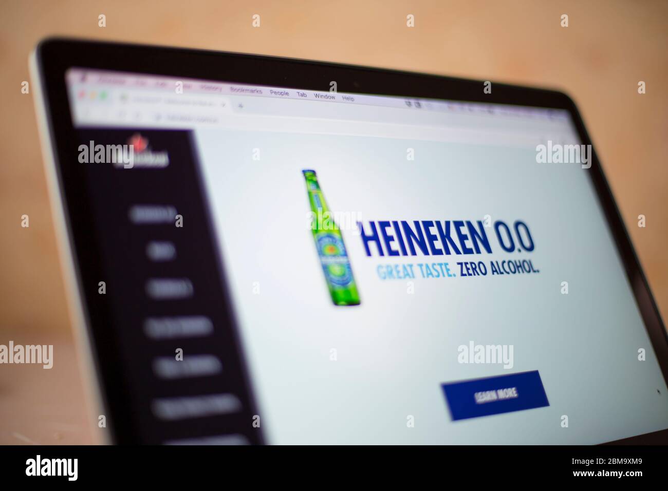 Heineken web site on computer screen. Heineken is Dutch brewing company founded in 1864. Stock Photo