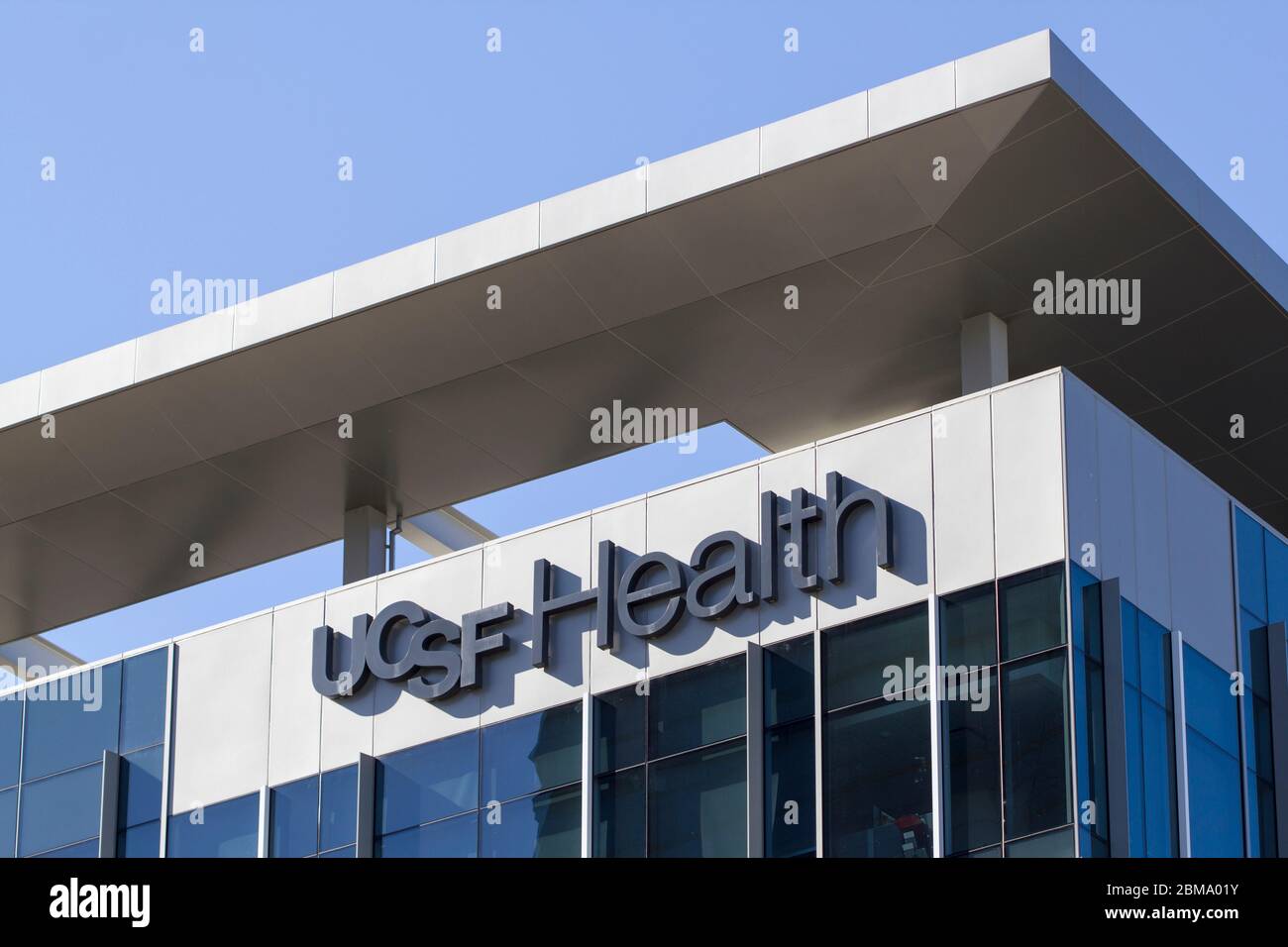 The UCSF Health sign seen in UCSF Medical Center at Mission Bay in San Francisco, California. Stock Photo